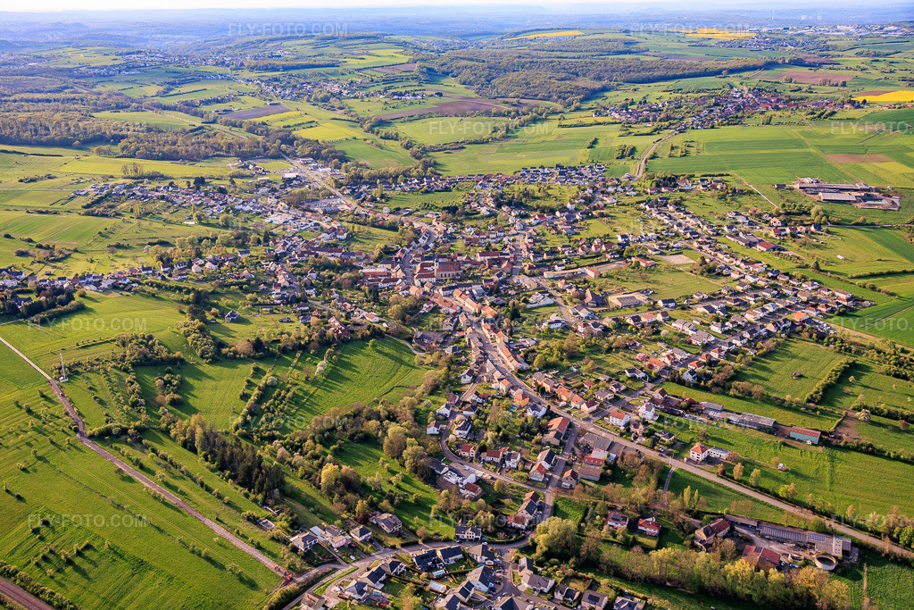 Aerial view: View of the town from the south in Diebling in the state Moselle, France.Photo: IMG_154238.jpg taken on 04/17/2026 by Werner Riehm/FLY-FOTO.comResolution of the original: 6000 x 4000 px