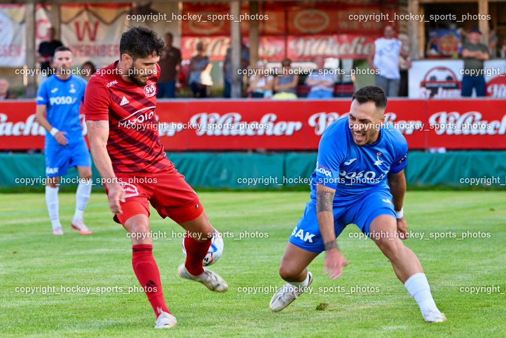 SV St.Jakob vs. SAK | #7 Manuel Alexander Schüttelkopf St.Jakob, #10 Yosifov Svetlozar Angelov SAK, SV St.Jakob vs. SAK, SV St.Jakob vs. SAK am 23.08.2024 in St. Jakob im Rosenthal (Sportplatz St. Jakob), Austria, (Photo by Bernd Stefan)