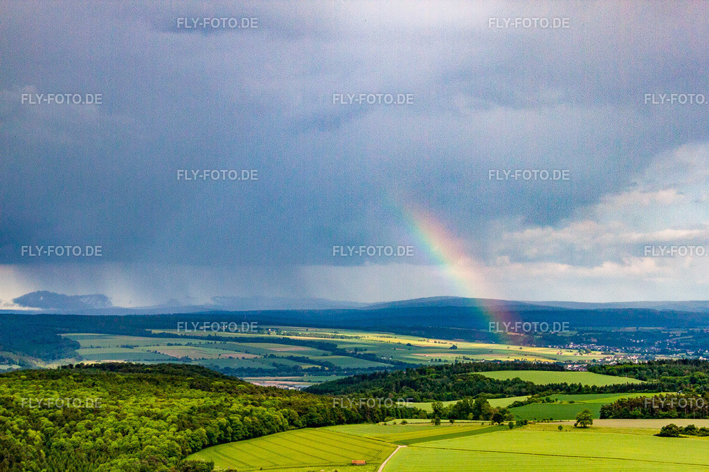 Regenbogen über dem Kahlenberg | Luftbild: Regenbogen über dem Kahlenberg im Ortsteil Ottbergen in Höxter im Bundesland Nordrhein-Westfalen in Deutschland. Foto: IMG_65354.jpg vom 24.05.2014 durch Werner Riehm/FLY-FOTO.de - Realisiert mit Pictrs.com
