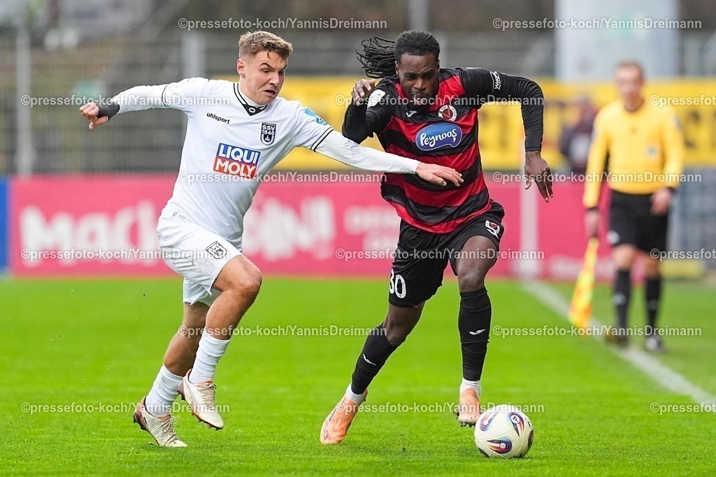 xYDRx06122501019 | 06.12.2025, xydrx, Fußball, 3.Liga, FC Viktoria Köln - SSV Ulm 1846, Saison 2025 2026, Sportpark Höhenberg:  Max Scholze (SSV Ulm 1846 #28) im Zweikampf gegen Yannick Tonye (FC Viktoria Köln #30)      DFB regulations prohibit any use of photographs as image sequences and or quasi-video.Photo: xYannisxDreimannxPressefotoKochx