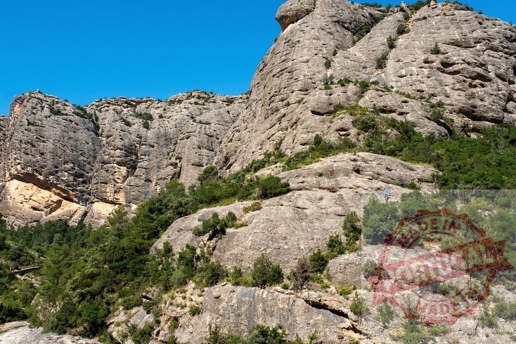 Montserrat mountains landscape with hiker walking trail | Hiker navigating a rocky path on the Montserrat mountain range in Catalonia, Spain - Realisiert mit Pictrs.com