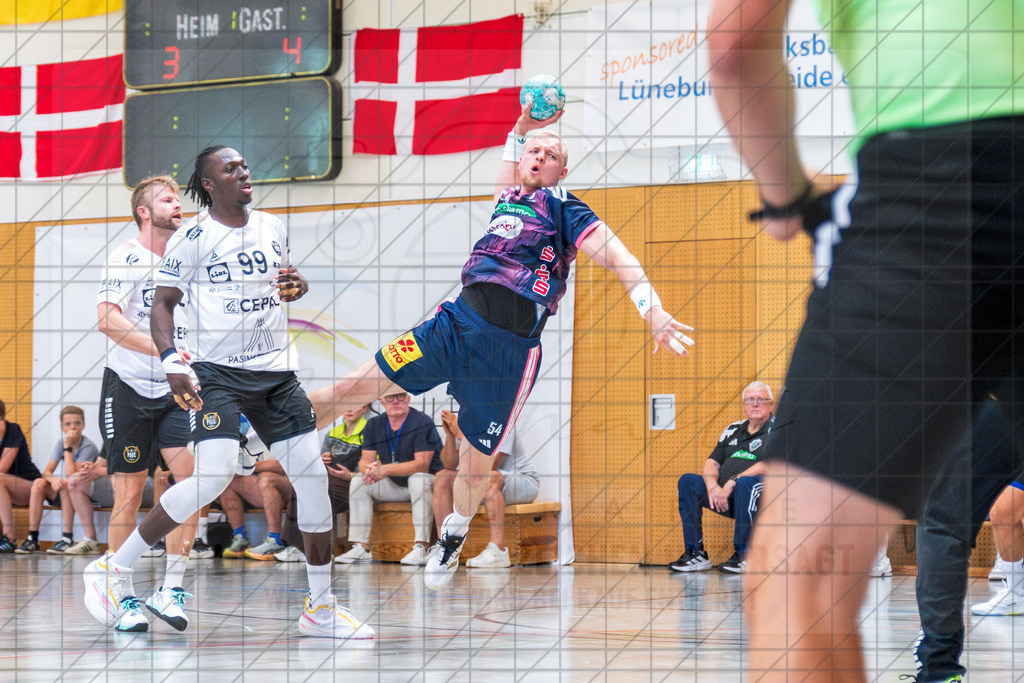 IHC 2026 - TSV Hannover-Burgdorf vs. PAUC Handball | Justus Fischer (TSV Hannover-Burgdorf #54); IHC 2026 - TSV Hannover-Burgdorf vs. PAUC Handball am 08.08.26 in Sporthalle KGS, Schneverdingen - Realisiert mit Pictrs.com