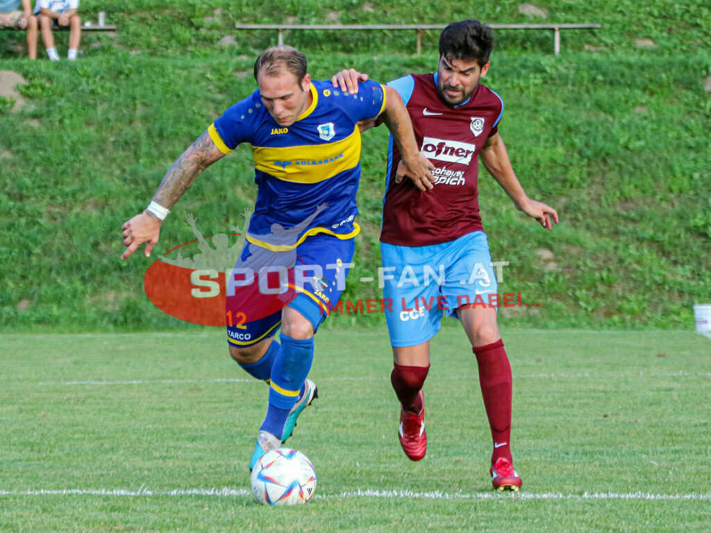 SK Maria Saal - DSG Ferlach 2-3, Unterliga Ost | Andreas Schritliser (DSG Ferlach #12) Aldamir Da Silva (SK Maria Saal #3) SK Maria Saal - DSG Ferlach 2-3 am 22.08.2023 in Maria Saal
(Sportplatz), Austria, (Photo by Ernst Krawagner sport-fan.at) - Realisiert mit Pictrs.com