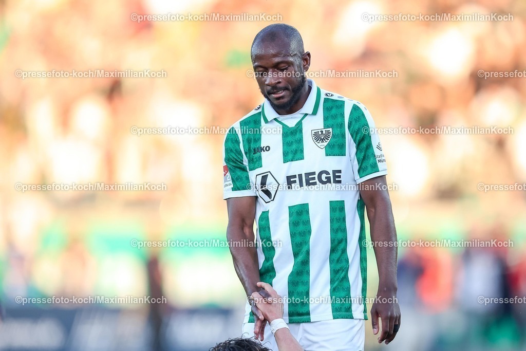 SCP09052502368 | 09.05.2025, Fußball, Preußen Münster - Hertha BSC, 2. Fußball Bundesliga, 33. Spieltag, Preußenstadion, Saison 2024 2025: David Kinsombi (Preussen Muenster #04) DFB regulations prohibit any use of photographs as image sequences and or quasi-video.