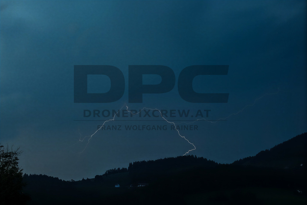 Lightning Storm over the Almenland | Multiple lightning strikes illuminate the night sky over the Almenland region in Austria during a powerful summer thunderstorm. - Realisiert mit Pictrs.com