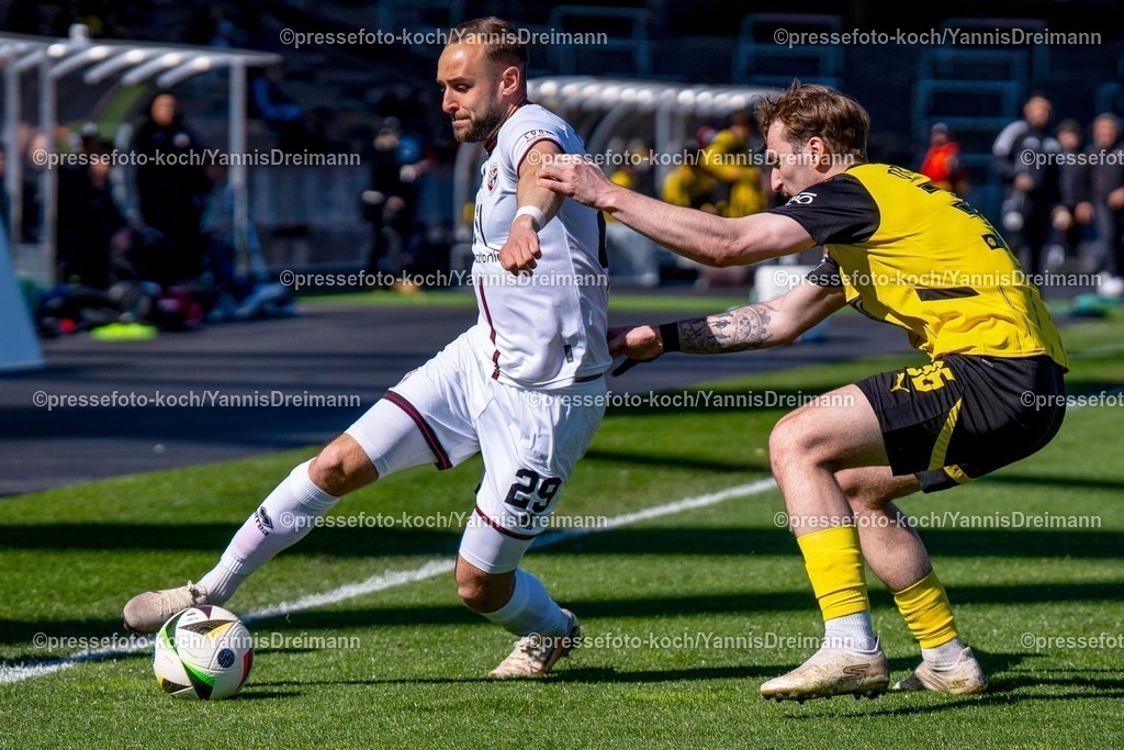 xydr06042501048 | 06.04.2025, xydrx, Fußball, Borussia Dortmund II - FC Ingolstadt 04, 3.Liga, Stadion Rote Erde, Saison 2024 2025: David Kopacz (FC Ingolstadt #29) im Zweikampf gegen Tony Reitz (Borussia Dortmund II #36) DFB regulations prohibit any use of photographs as image sequences and or quasi-video.