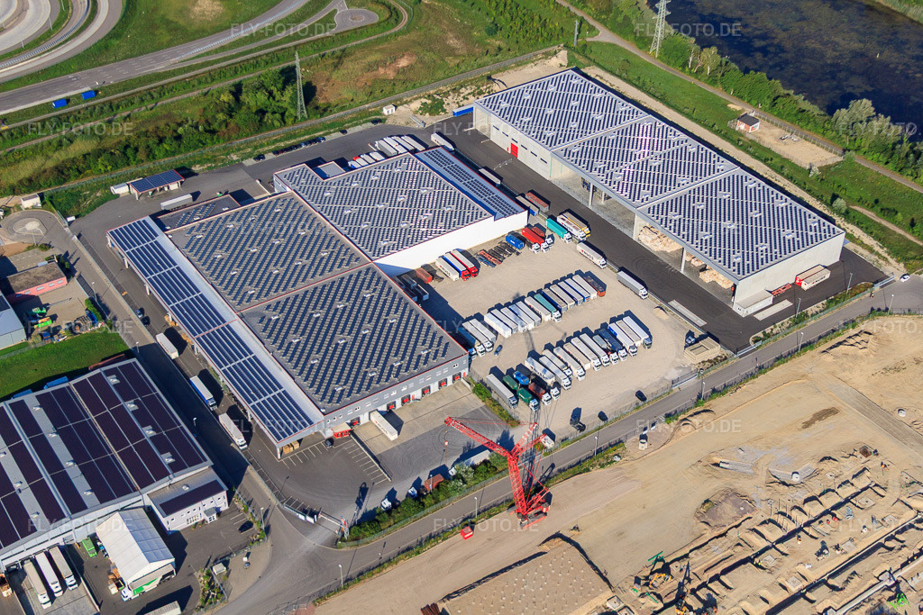 Luftbild: Hallen und LKW der NUSS-Unternehmensgruppe im Industriegebiet Oberwald in Wörth am Rhein im Bundesland Rheinland-Pfalz in Deutschland. Foto: IMG_51710.jpg vom 11.08.2012 durch Werner Riehm/FLY-FOTO.deWhatsApp
