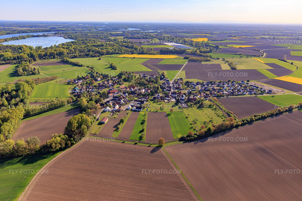 Aerial view: View of the town from the northeast in Neuhaeusel in the state Bas-Rhin, France. – Photo: IMG_099067.jpg taken on 04/23/2017 by Werner Riehm/FLY-FOTO.com – Resolution of the original: 5472 x 3648 px