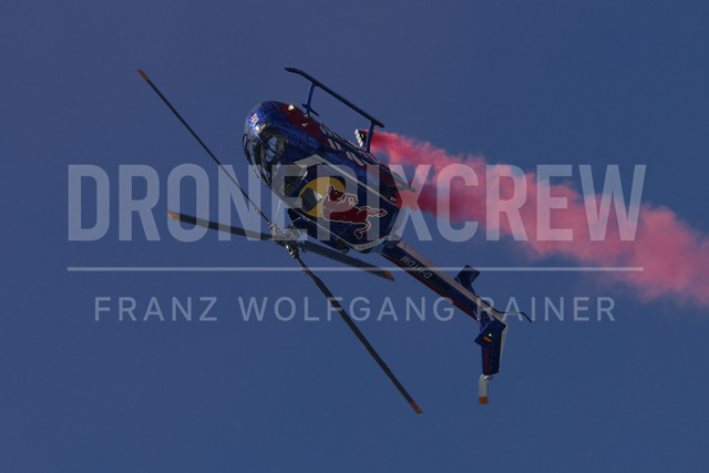 Audi FIS Ski World Cup: Men’s Slalom – Hahnenkamm Race, Kitzbuehel | Kitzbuehel, Austria, 25.Jan.26 - Alpine Skiing - FIS World Cup, Hahnenkamm Race, Slalom, men. The image shows red bull helicopter air show.
