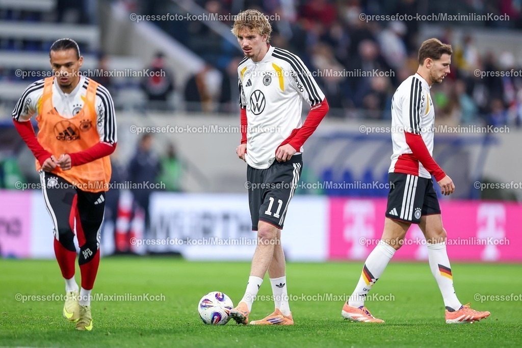 DFB14112503060 | 14.11.2025, Fußball, Länderspiel, WM-Qualifikation Europa, Deutschland - Luxemburg, Stade de Luxembourg (Croix de Gasperich, Luxemburg), 9. Spieltag, Saison 2025 2026: v.l. Leroy Sane (GER #19) Nick Woltemade (GER #11) Florian Wirtz (GER #17) Regulations prohibit any use of photographs as image sequences and or quasi-video.