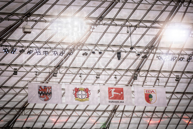 German Bundesliga, Bayer 04 Leverkusen vs. FC Augsburg, 18.04.2026 | LEVERKUSEN, GERMANY - APRIL 18, 2026 :  The flags of Leverkusen, the Bundesliga and Augsburg before  the German Bundesliga match on gameday 30 between Bayer 04 Leverkusen vs. FC Augsburg at BayArena on April 18, 2026 in Leverkusen, Germany. DFL REGULATIONS PROHIBIT ANY USE OF PHOTOGRAPHS AS IMAGE SEQUENCES AND/OR QUASI-VIDEO.