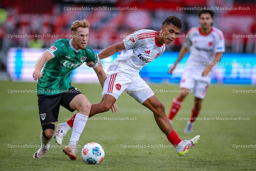 PRM22082501125 | 22.08.2025, Fußball, Preußen Münster - 1. FC Nürnberg, 2. Fußball Bundesliga,  Preußenstadion, Saison 2025 2026: Luca Bolay&nbsp;(Preussen Muenster #25) im Zweikampf gegen  Henri Koudossou&nbsp;(1FC Nuernberg #08)  DFB regulations prohibit any use of photographs as image sequences and or quasi-video.