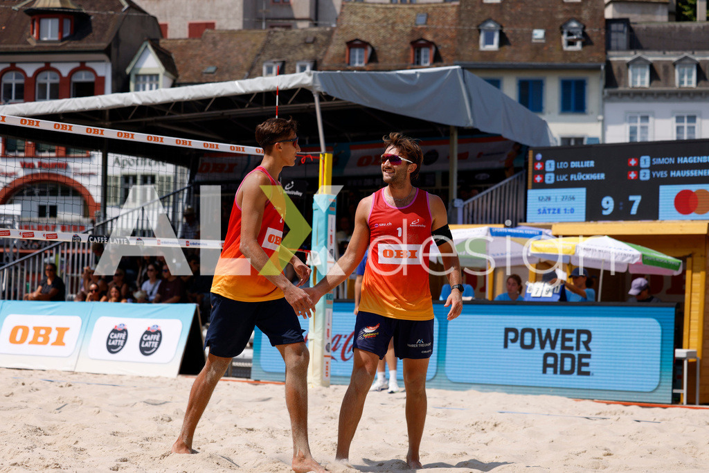 Obi BeachTour 2026 - Basel | BASEL, SWITZERLAND - JULY 19: LUC EMANUEL FLÜCKIGER (SUI) and LEO DILLIER (SUI) during the Obi BeachTour 2026 match between DILLIER / FLÜCKIGER (SUI) and HAGENBUCH / HAUSSENER (SUI) at Barfüsserplatz on July 19, 2026 in Basel, Switzerland. - Realisiert mit Pictrs.com