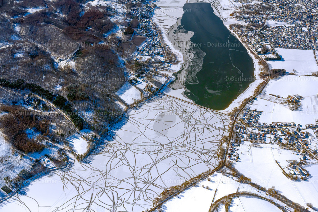 4043676 | GüNNE 13.02.2021 Winterlich schneebedeckte Staubecken und Uferbereiche am Stausee " Möhnsee " in Günne im Ruhrgebiet im Bundesland Nordrhein-Westfalen, Deutschland. Weiterführende Informationen bei: Ruhrverband. // Wintry snowy impoundment and shore areas at the lake " Moehnsee " in Guenne at Ruhrgebiet in the state North Rhine-Westphalia, Germany. Further information at: Ruhrverband. Foto: Gerhard Launer