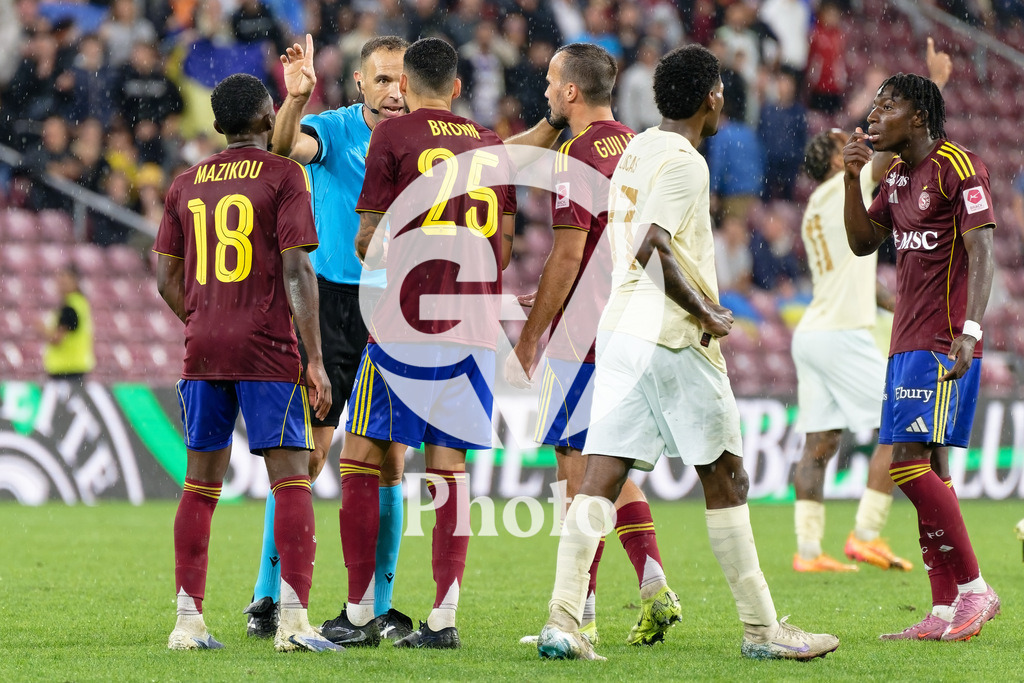 UEFA Conference League Play-offs 2nd leg - Servette FC v FC Shakhtar Donetsk | Dylan Bronn (25 Servette FC) speaks with Guillermo Cuadra Fernandez referee  during the UEFA Conference League Play-offs 2nd leg match between Servette FC and FC Shakhtar Donetsk at Stade de Geneve in Geneva, Switzerland