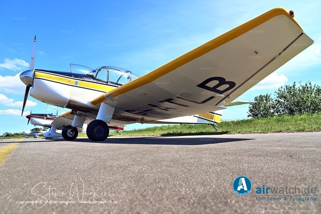 Jodel DR1050M - Flugplatz Husum - The standard engine is the 100 hp (75 kW) Continental O-200 | The standard engine is the 100 hp (75 kW) Continental O-200 four-stroke powerplant, although the Potez 4E engine (105 hp) was also used in some variants. The aircraft has a maximum takeoff weight of 780 kg (1,719 lb), a maximum cruising speed of 210 km/h (110 kn), and a maximum speed of 220 km/h (120 kn). Its range is approximately 980 km (609 mi) with full fuel tanks, and it can achieve a service ceiling of 3,600 m (11,811 ft).