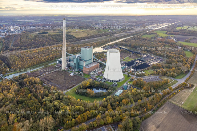 Bergkamen231102048 | Luftbild, Kraftwerk Bergkamen mit Schornstein und Kühlturm, hinten die Wasserstadt Aden, Baugebiet für geplantes Stadtquartier auf dem Gelände der ehemaligen Zeche Haus Aden, umgeben von Wald mit herbstlichen Laubbäumen, Himmel und Fernsicht, Heil, Bergkamen, Ruhrgebiet, Nordrhein-Westfalen, Deutschland