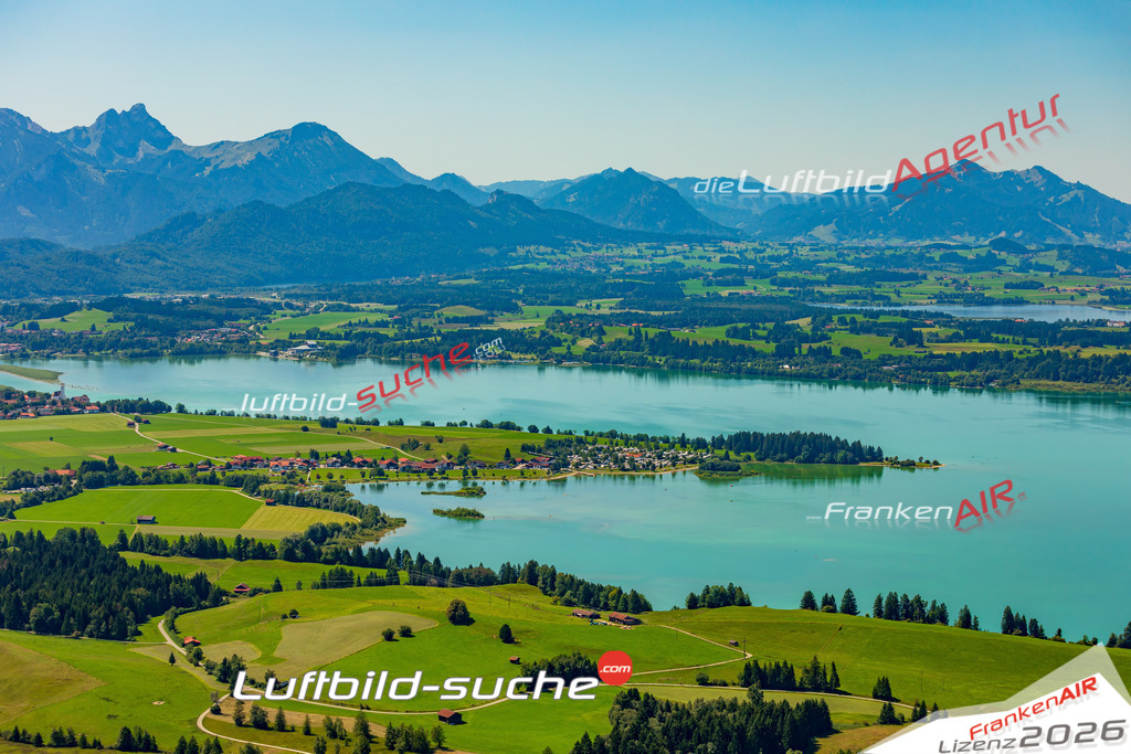 Klassische Luftaufnahme ohne Drohne zeigt:Brunnen bei Schwangau - Die Luftbildaufnahme wurde 2025 vom UL-Flugzeug heraus erstellt ( keine Drohne ) - Hochauflösende Luftaufnahme -Nicht vergleichbar mit Google Maps oder Satelittenbilder- Die Geschenkidee !Mit Lizenz und Bildrechte bestellbar