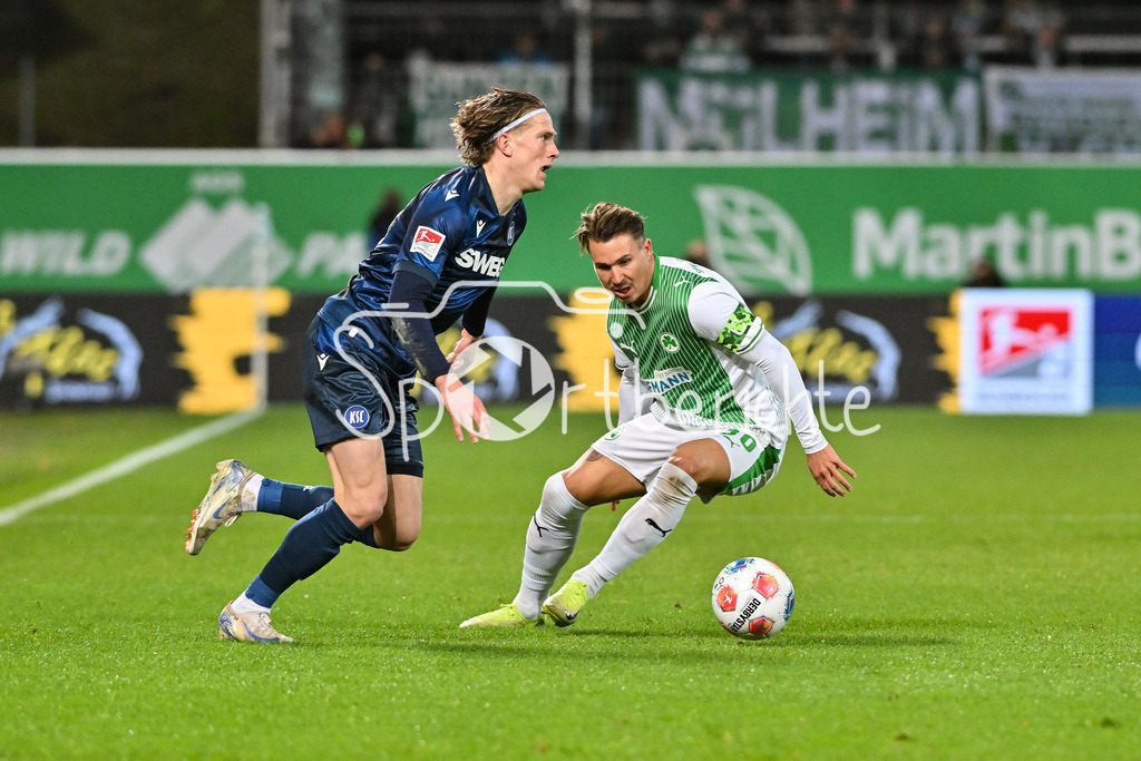 SpVgg Greuther Fürth - Karlsruher SC | FUERTH, GERMANY - OCTOBER 24: David HEROLD (Karlsruher SC 20) against Felix KLAUS (SpVgg Greuther Fuerth 30) during the 2. bundesliga match between SpVgg Greuther Fuerth vs. Karlsruher SC on matchday 10 at Sportpark Ronhof Thomas Sommer on October 24, 2025 in Fuerth, Germany / DFL REGULATIONS PROHIBIT ANY USE OF PHOTOGRAPHS AS IMAGE SEQUENCES AND/OR QUASI-VIDEO