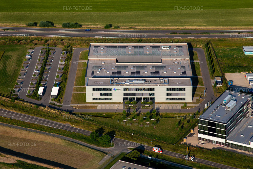 Luftbild: Eizo, Carl-Benz-Straße in Rülzheim im Bundesland Rheinland-Pfalz in Deutschland. – Foto: IMG_136184.jpg vom 07.06.2023 durch Werner Riehm/FLY-FOTO.de – Auflösung des Originals: 5162 x 3442 px