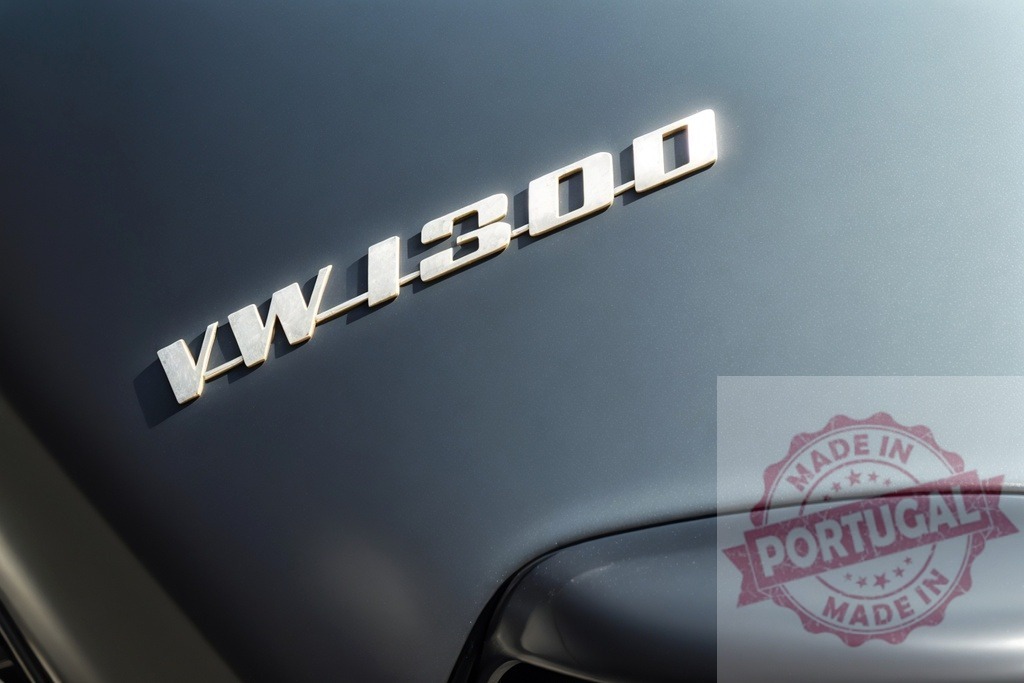 Volkswagen VW 1300 badge on classic car | Volkswagen VW 1300 car badge showcasing vintage automotive design detail - Realisiert mit Pictrs.com