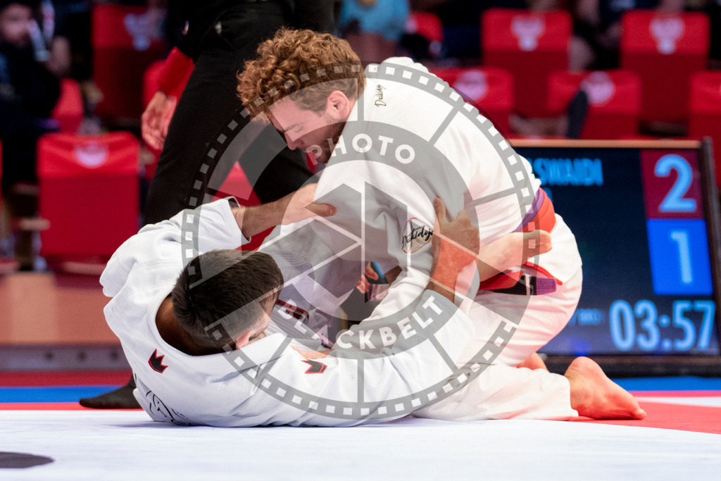 20231108PBB1842 | Fighters compete during the AJP World Professional Championship in the Mubadala Arena in Abu Dhabi, Arab United Emirates, on November 8, 2023.
