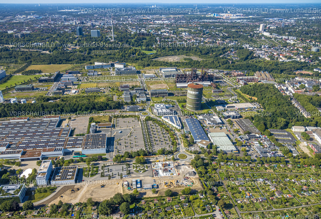 Dortmund240804059 | Luftbild, Technologiepark Gewerbegebiet Phoenix West, Gesamtansicht und Blick zum Westfalenpark mit Florianturm, Hörde, Dortmund, Ruhrgebiet, Nordrhein-Westfalen, Deutschland