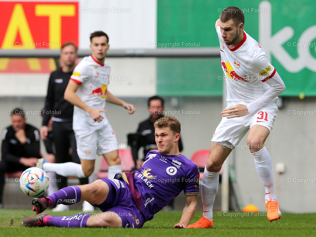 ALUI_02042023_11 | SPORT,FUSSBALL,ADMIRAL BUNDESLIGA AUSTRIA KLAGENFURT-RED BULL SALZBURG  02.04.2023 IM BILD:NICOLAS BINDER WERNITZIG (KLAGENFURT) UND  STRAHINJA PACLOVIC   (RED BULL SALZBURG) FOTO:FOTOLUI/MW