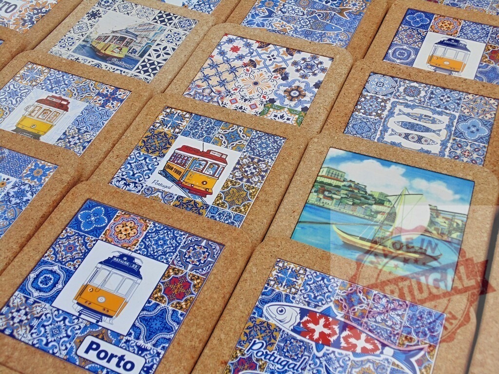 Portuguese souvenir coasters with Porto and tram designs | Group of traditional Portuguese design coasters featuring azulejo patterns and cork material - Realized with Pictrs.com