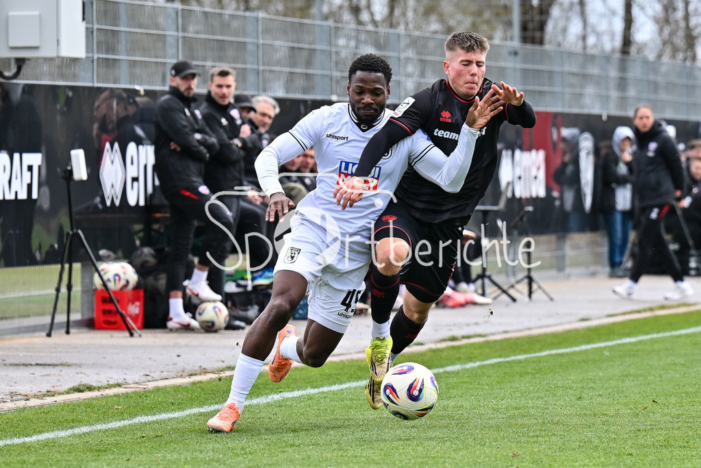 FC Ingolstadt - SSV Ulm 1846 Fussball  | INGOLSTADT, GERMANY - 25. MAERZ: im Duell Streli MAMBA (SSV Ulm 45) und Gustav CHRISTENSEN (FC Ingolstadt 24) während dem Testspiel zwischen dem FC Ingolstadt und dem SSV Ulm 1846 Fussball auf Platz 4 am Audi Sportpark