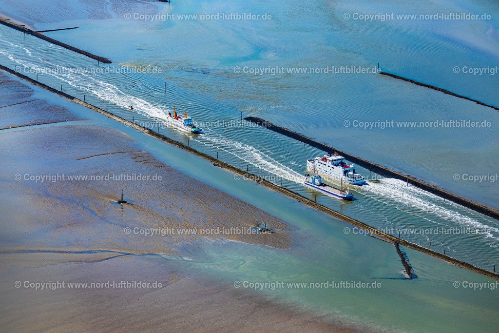 Norddeich_Fähren_Frisia_Iv_Inselfracht_ELS_7381050923 | NORDEN 05.09.2023 Fahrt eines Fähr- Schiffes der AG Reederei Norden-Frisia Schiff " Frisia 4 " und der Lastfähre " Inselfracht " in Norden Norddeich im Bundesland Niedersachsen, Deutschland. Weiterführende Informationen bei: Reederei Norden-Frisia AG. // Journey of a ferry ship of the AG Reederei Norden-Frisia ship "Frisia 4" and the cargo ferry "Inselfreight" in Norden Norddeich in the state Lower Saxony, Germany. Further information at: Reederei Norden-Frisia AG. Foto: Martin Elsen