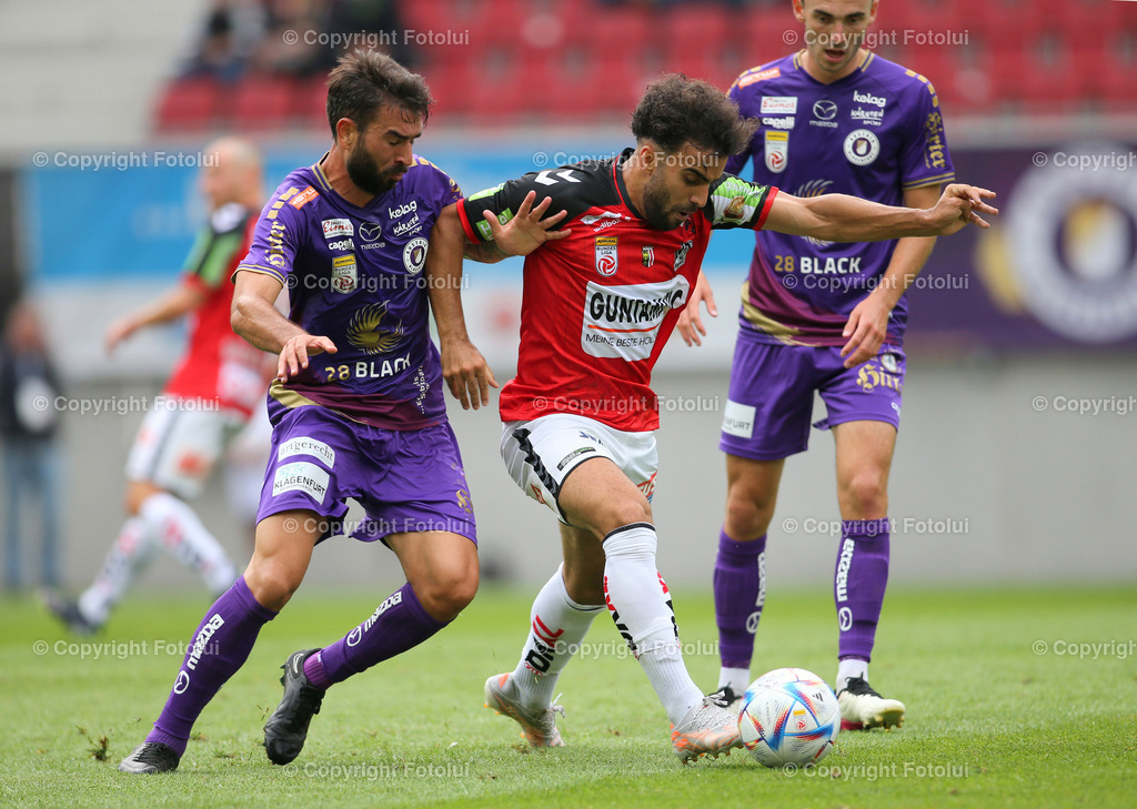 A_LUI_130822_0006 | SPORT,FUSSBALL,ADMIRAL BUNDESLIGA AUSTRIA KLAGENFURT-SV GUNTAMATIC RIED 14.08.2022 IM BILD: KOSMOS GKEZOS (KLAGENFURT) UND DENIZCAN COSGUNES  (RIED FOTO: FOTOLUI/MARIO WIMMER