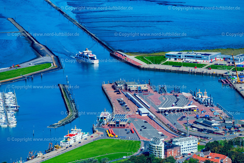 Norddeich_Fährhafen_Für_Norderney_ELS_7420050923 | NORDEN 05.09.2023 Fähr- Hafenanlagen an der Meeres- Küste der Nordsee mit dem Fährschiff Frisia 4 im Ortsteil Norddeich in Norden im Bundesland Niedersachsen, Deutschland. Weiterführende Informationen bei: Reederei Norden-Frisia AG,  Yachtzentrum Störtebeker GmbH. // Ferry port facilities on the sea coast of the North Sea with the ferry Frisia 4 in the district of Norddeich in Norden in the state of Lower Saxony, Germany. Further information at: Reederei Norden-Frisia AG,  Yachtzentrum Stoertebeker GmbH. Foto: Martin Elsen