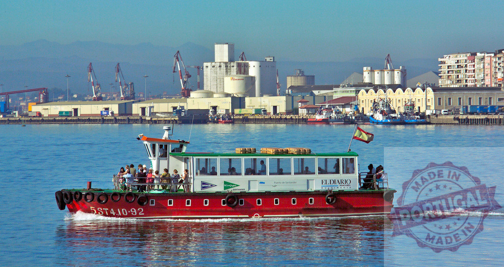 Ferry boat navigating Santander Bay with industrial port. Spain - Bilbao | Ferry boat transporting passengers on the water with industrial port cranes in the background - Realisiert mit Pictrs.com