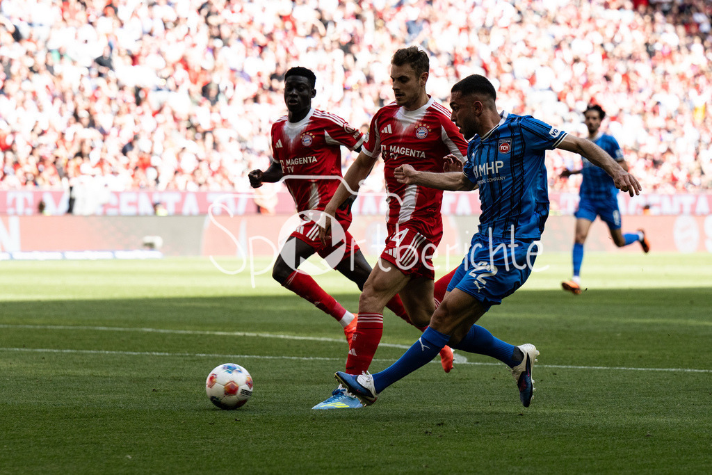 FC Bayern München - 1. FC Heidenheim | MUNICH, GERMANY - 02. MAI: im Duell Josip STANISIC (FC Bayern Munich 44) und Arijon IBRAHIMOVIC (1. FC Heidenheim 22) während dem Bundesligamatch zwischen dem FC Bayern München und dem 1. FC Heidenheim am 32. Spieltag in der Allianz Arena / DFL REGULATIONS PROHIBIT ANY USE OF PHOTOGRAPHS AS IMAGE SEQUENCES AND/OR QUASI-VIDEO