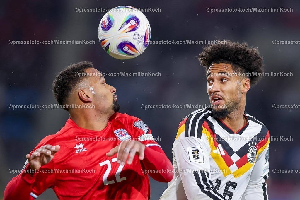DFB14112501122 | 14.11.2025, Fußball, Länderspiel, WM-Qualifikation Europa, Deutschland - Luxemburg, Stade de Luxembourg (Croix de Gasperich, Luxemburg), 9. Spieltag, Saison 2025 2026: Marvin Martins (LUX #22) im Zweikampf gegen  Kevin Schade (GER #16)  Regulations prohibit any use of photographs as image sequences and or quasi-video.