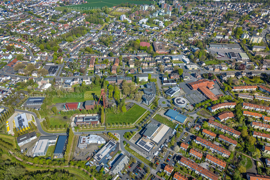 Kamen230406093 | Luftbild, Nahversorgungszentrum mit Rewe Supermarkt und Aldi Supermarkt, Technopark Kamen, Ehemalige Zeche Monopol Schacht Grillo, Förderturm, Kamen, Ruhrgebiet, Nordrhein-Westfalen, Deutschland