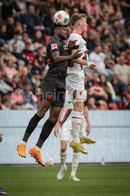 German Bundesliga, Bayer 04 Leverkusen vs. FC Augsburg, 18.04.2026 | LEVERKUSEN, GERMANY - APRIL 18, 2026 :  Patrik Schick (Bayer 04 Leverkusen, 14) and Anton Kade (FC Augsburg, 30) in an airtight during the German Bundesliga match on gameday 30 between Bayer 04 Leverkusen vs. FC Augsburg at BayArena on April 18, 2026 in Leverkusen, Germany. DFL REGULATIONS PROHIBIT ANY USE OF PHOTOGRAPHS AS IMAGE SEQUENCES AND/OR QUASI-VIDEO.