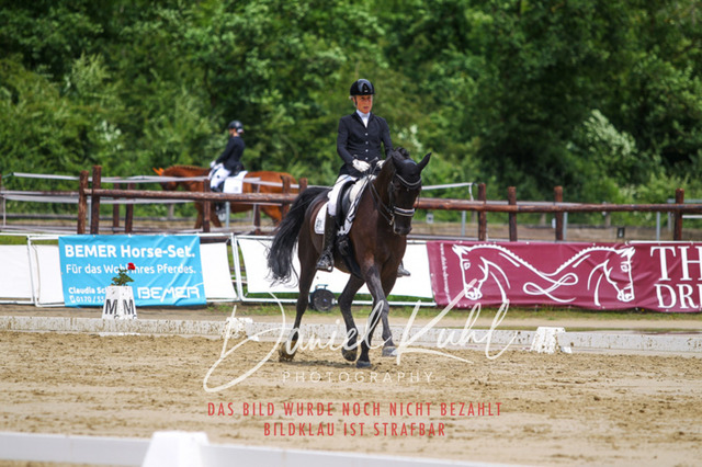 DKP40670 | Turniersportfotografie; Pferdefotografie; Dressurfotografie