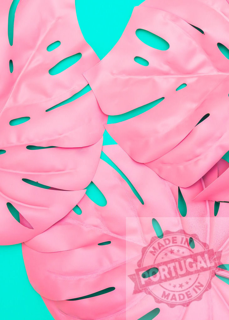 Pink monstera leaves creating a tropical pattern on turquoise background | Pink monstera deliciosa leaves creating a beautiful pattern on a turquoise background, tropical vibes for summer concepts - Realized with Pictrs.com