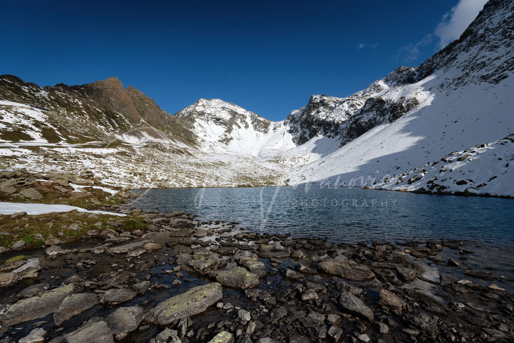 Kühtai | Oberer Plenderlesssee mit erstem Schnee im Herbst