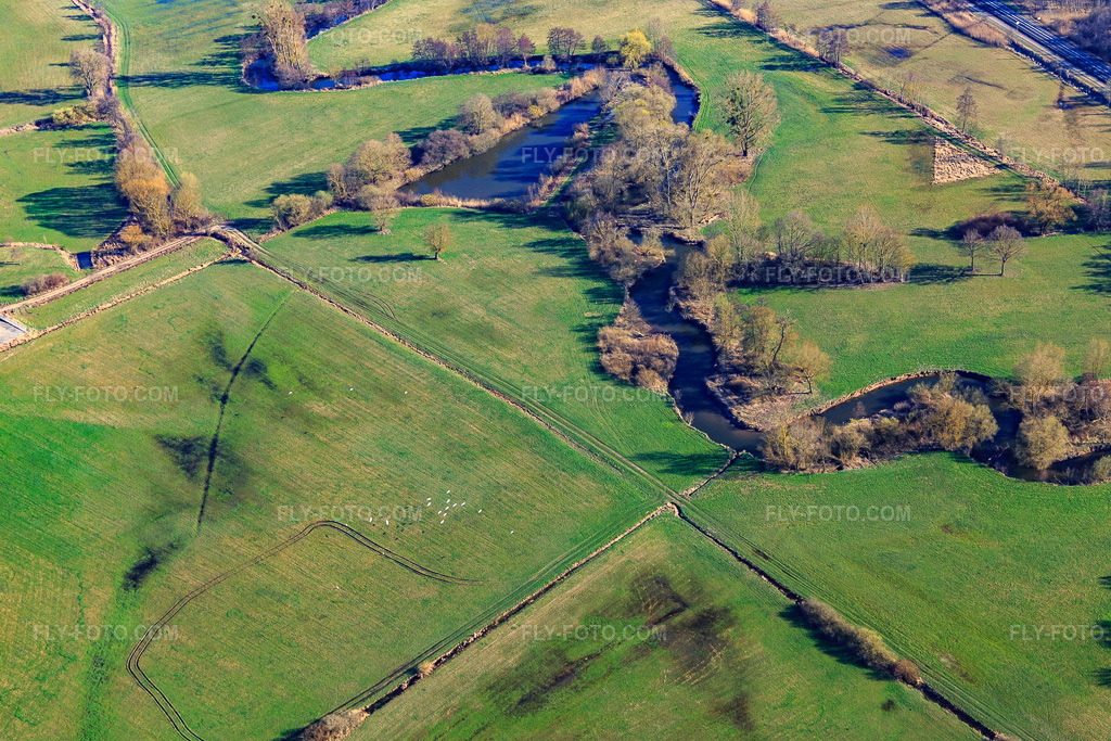 Aerial view: Meadows along the zigzag course of the Zorn in Dettwiller in the state Bas-Rhin, France. – Photo: IMG_097547.jpg taken on 03/16/2017 by Werner Riehm/FLY-FOTO.com – Resolution of the original: 5472 x 3648 px