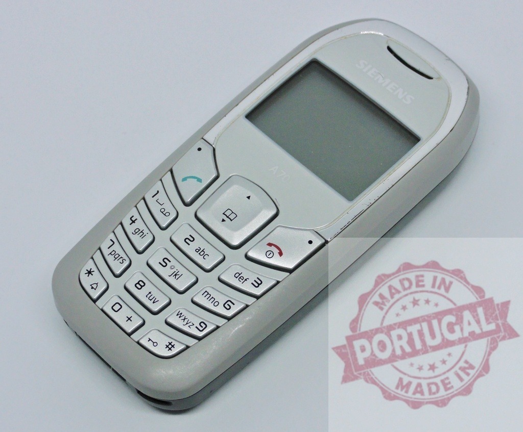 Old Siemens Mobile Phone Showing Arabic and Latin Letters on Keypad | Vintage Siemens mobile phone with Arabic and Latin letters on keypad, illustrating globalization and communication technology - Realisiert mit Pictrs.com