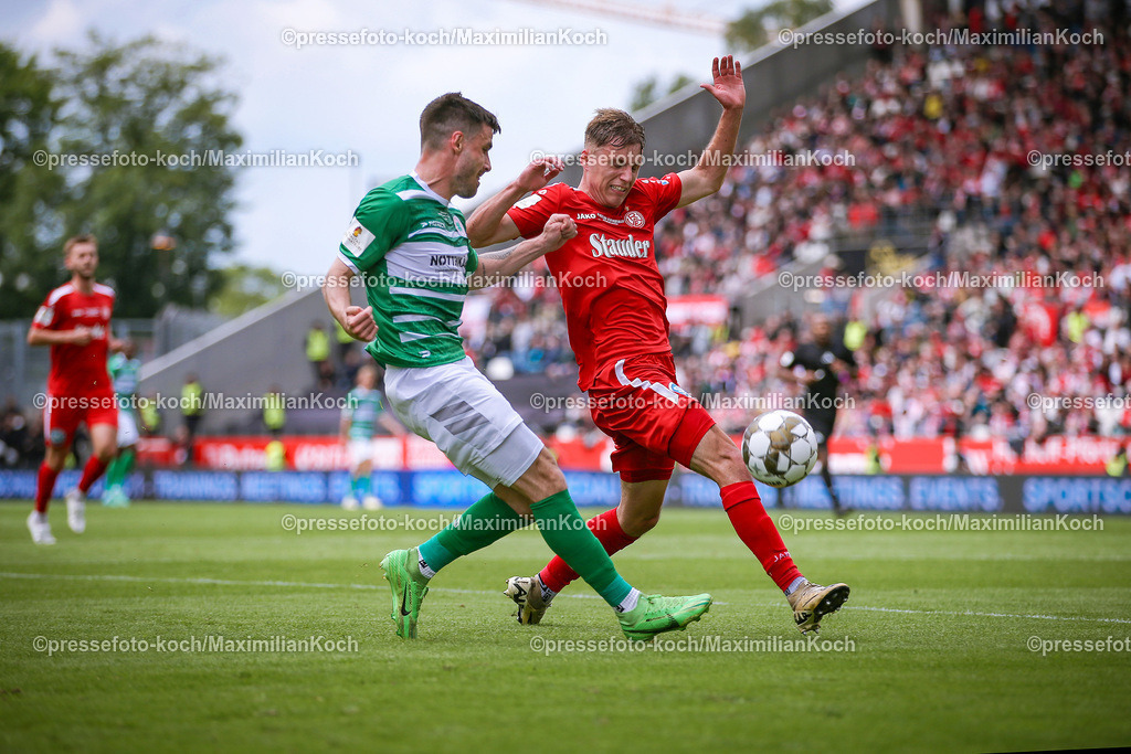 RWE3Liga25052401020 | 25.05.2024, Essen, Fußball, Finaltag der Amateure, Niederrheinpokal Finale, Stadion an der Hafenstraße, Saison 2023 2024, Rot-Weiss Essen – SC Rot-Weiß Oberhausen: Moritz Montag (RW Oberhausen) gegen Sascha Voelcke (Rot-Weiss Essen). 
DFB regulations prohibit any use of photographs as image sequences and or quasi-video.