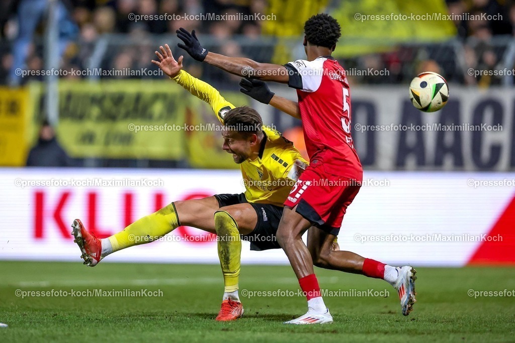 FCVK14022501017 | 14.02.2025, Fußball, FC Viktoria Köln – Alemannia Aachen, 3.Liga, Sportpark Höhenberg, Saison 2024 2025: Sasa Strujic (Alemannia Aachen #5) im Zweikampf gegen Sidny Lopes Cabral (Viktoria Köln #5)DFB regulations prohibit any use of photographs as image sequences and or quasi-video.