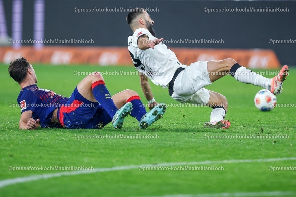 BMG28112501042 | 28.11.2025, Fußball, Borussia Mönchengladbach - RB Leipzig, 1. Fußball Bundesliga, 12.Spieltag, Borussia-Park, Saison 2025 2026: Willi Orban (RB Leipzig #04) im Zweikampf gegen  Franck Honorat (Borussia Mönchengladbach #09) DFB regulations prohibit any use of photographs as image sequences and or quasi-video.