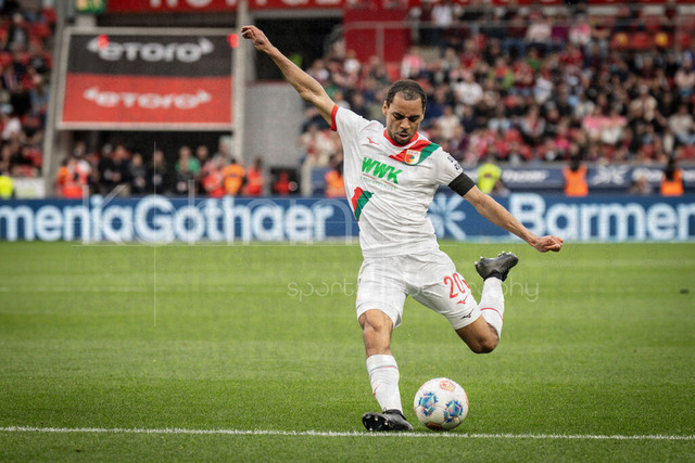 German Bundesliga, Bayer 04 Leverkusen vs. FC Augsburg, 18.04.2026 | LEVERKUSEN, GERMANY - APRIL 18, 2026 :  Alexis Claude-Maurice (FC Augsburg, 20) shoots during the German Bundesliga match on gameday 30 between Bayer 04 Leverkusen vs. FC Augsburg at BayArena on April 18, 2026 in Leverkusen, Germany. DFL REGULATIONS PROHIBIT ANY USE OF PHOTOGRAPHS AS IMAGE SEQUENCES AND/OR QUASI-VIDEO.