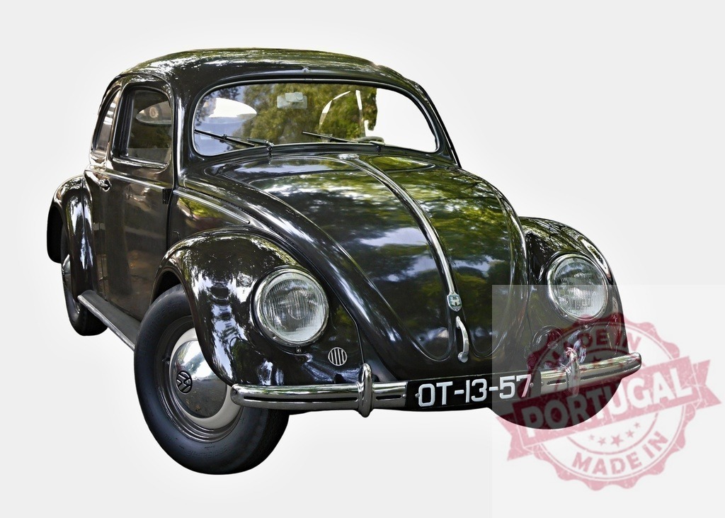 Classic Volkswagen Beetle car parked, representing automotive history and vintage design | Shiny black Volkswagen Beetle parked, showcasing its iconic design and historical significance in automotive history - Realized with Pictrs.com