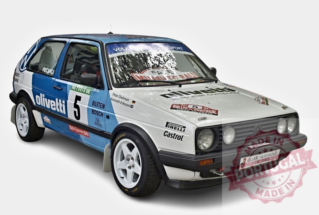 Volkswagen Golf GTI Rally Car showcasing sponsors logos | White and blue Volkswagen Golf GTI rally car with various sponsor logos, including Olivetti, Bilstein, Bosch, Pirelli and Castrol - Realisiert mit Pictrs.com
