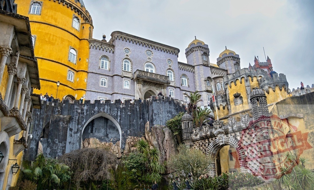 Pena Palace colorful romantic architecture in Sintra Portugal | Pena Palace showcasing colorful romantic architecture and historic landmark status in Sintra, Portugal - Realized with Pictrs.com